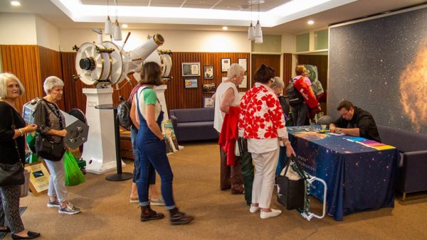 Patrons arriving at the Summer Lecture. Image Credit: Geoff Scott