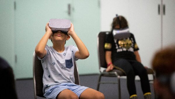 Kids trying out VR Headsets at Astrofest. Image Credit: ICRAR